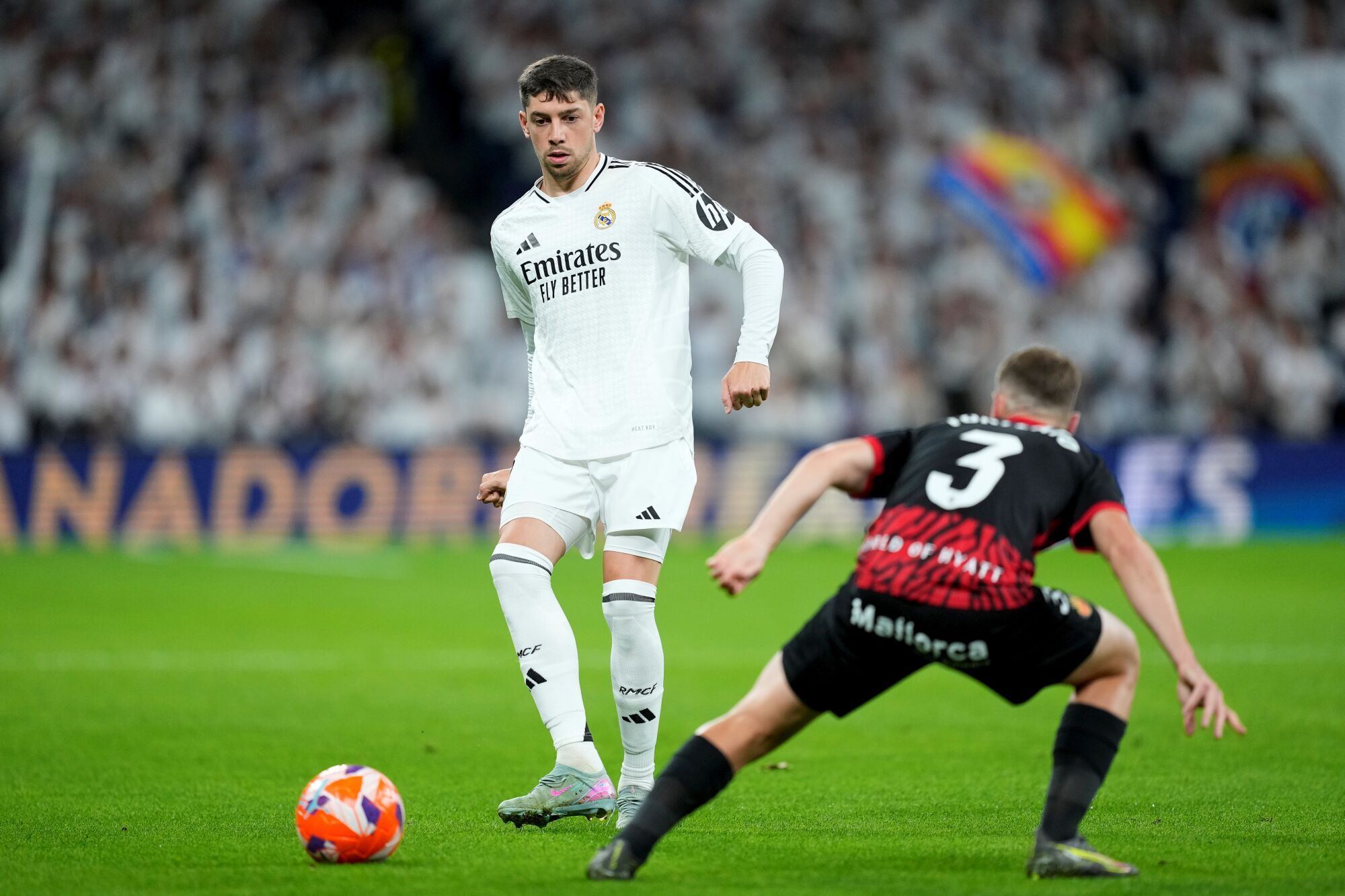 Federico Valverde of Real Madrid and Toni Lato of RCD Mallorca in action during the Spanish League, LaLiga EA Sports, football match played between Real Madrid and RCD Mallorca at Santiago Bernabeu stadium on May 14, 2025, in Madrid, Spain. AFP7 14/05/2025 ONLY FOR USE IN SPAIN. Oscar J. Barroso / AFP7 / Europa Press;2025;SOCCER;SPAIN;SPORT;ZSOCCER;ZSPORT;Real Madrid v RCD Mallorca - LaLiga EA Sports;