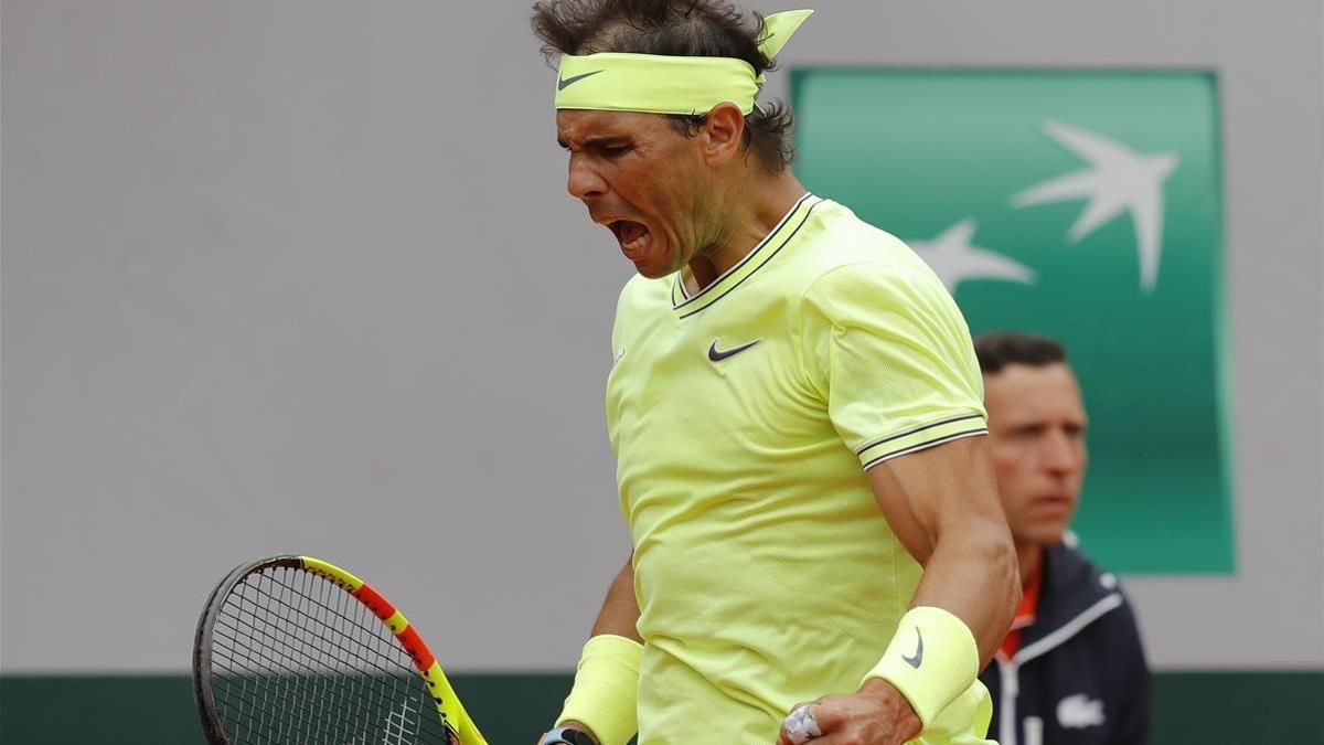 Rafa Nadal celebra la conquista de un punto ante Federer.