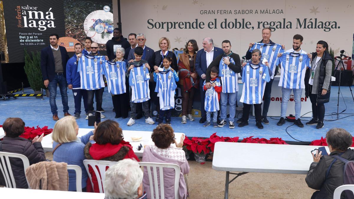 Los representantes malaguistas, en el escenario.