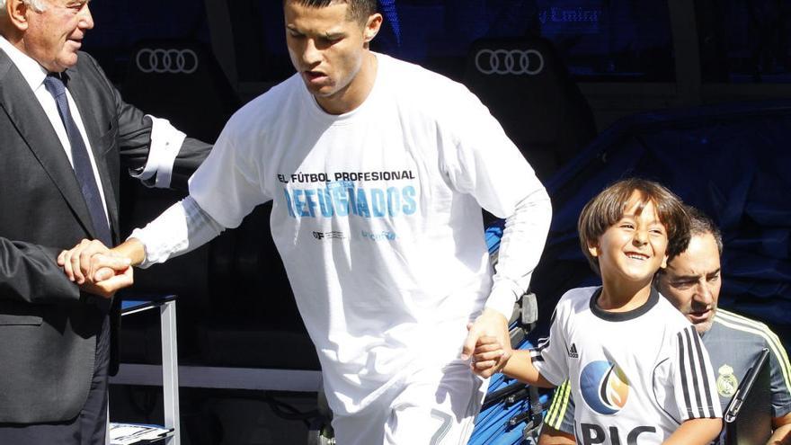 Zaid Abdul junto a Cristiano Ronaldo.