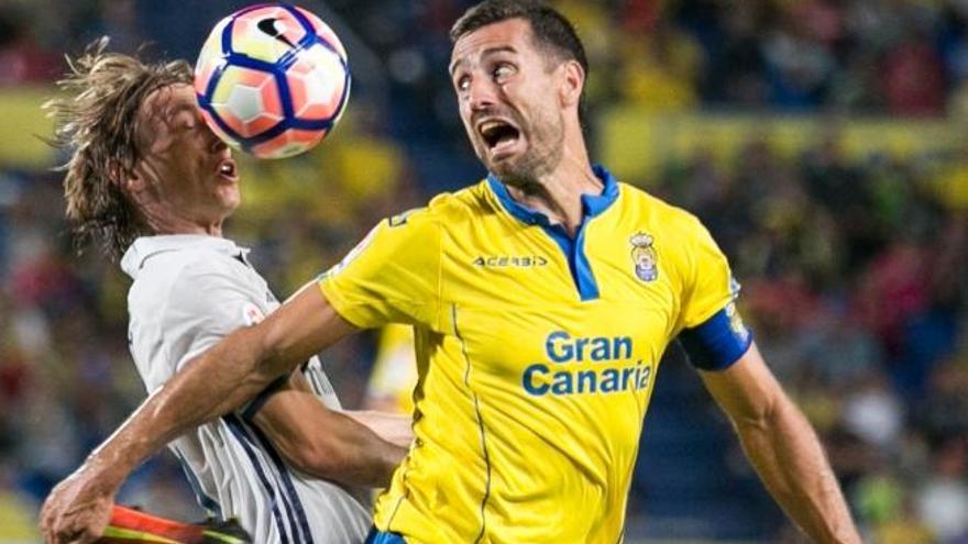 David García, junto a Modric.