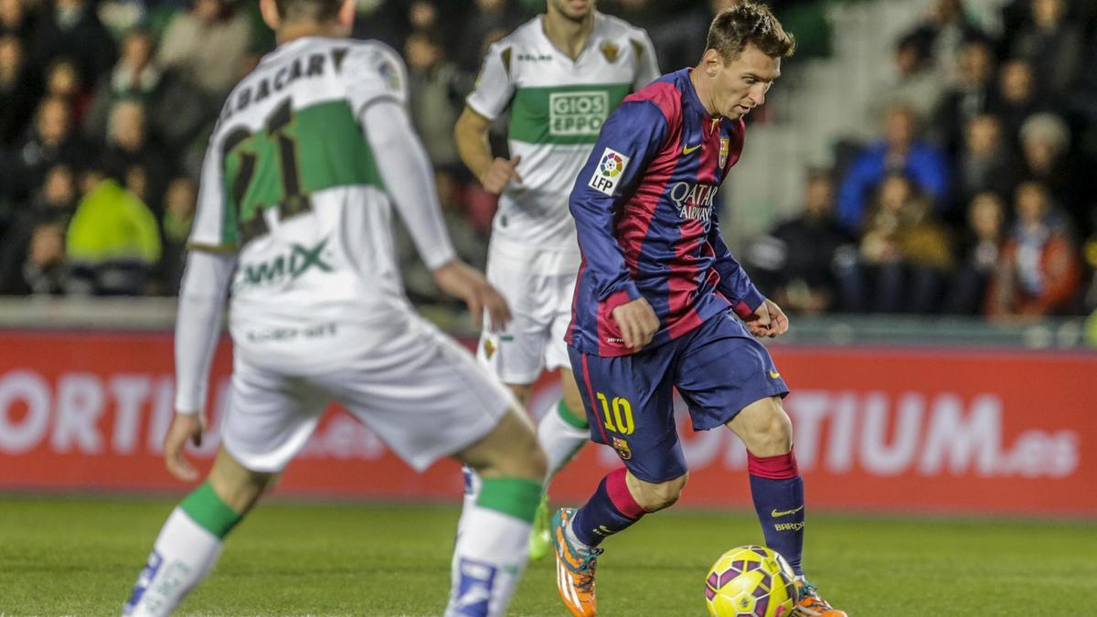 Messi, junto a Albacar y Lombán, durante la última visita del Barcelona a Elche en la temporada 2014-2015