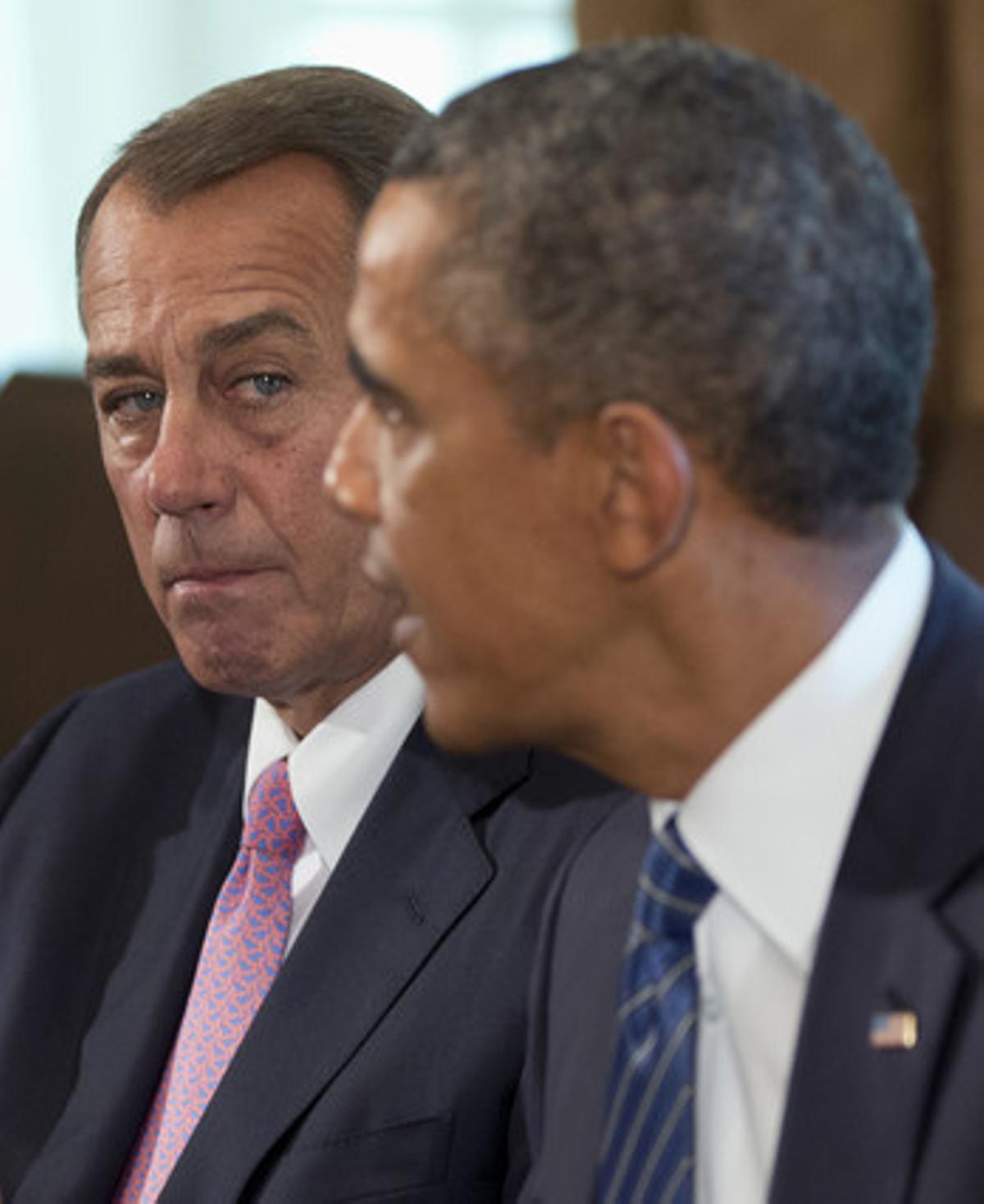 John Boehner escolta Barack Obama. John Boehner escolta Barack Obama.