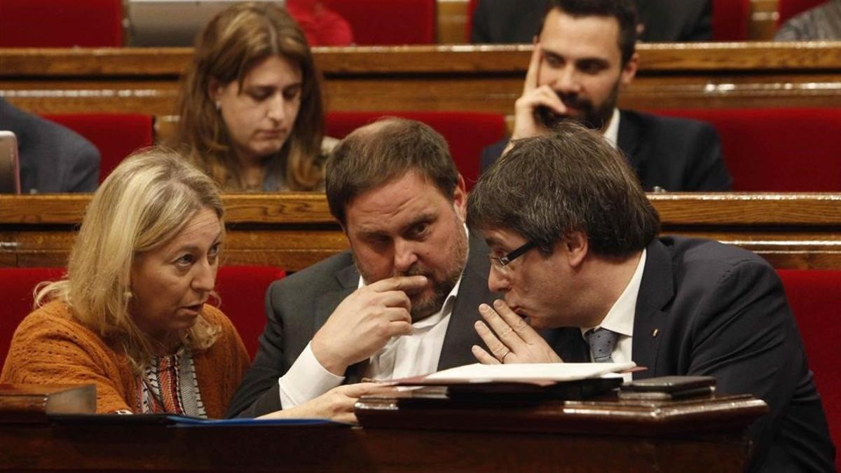 Neus Munté, Oriol Junqueras y Carles Puigdemont