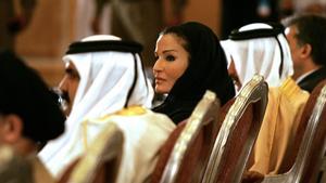 Former Iranian President Mohammad Khatami (L), Emir of Qatar Sheikh Hamad bin Khalifa al-Thani (2nd L) and his wife Sheikha Mozah bin Nasser Al-Missned attend a meeting for Alliance of Civilizations in Doha 26 February 2006. The Alliance of Civilizations is a 2005 initiative by Kofi Annan and the prime ministers of Spain and Turkey aimed at bringing together institutions and civil society to bridge prejudices and misunderstandings between peoples of different cultures and religions. The meeting was attended by Ekmeleddin Ihsanoglu, secretary general of the Organization of the Islamic Conference (OIC), Arab League chief Amr Mussa, and the foreign ministers of Qatar, Spain and Turkey. AFP PHOTO/KARIM JAAFAR