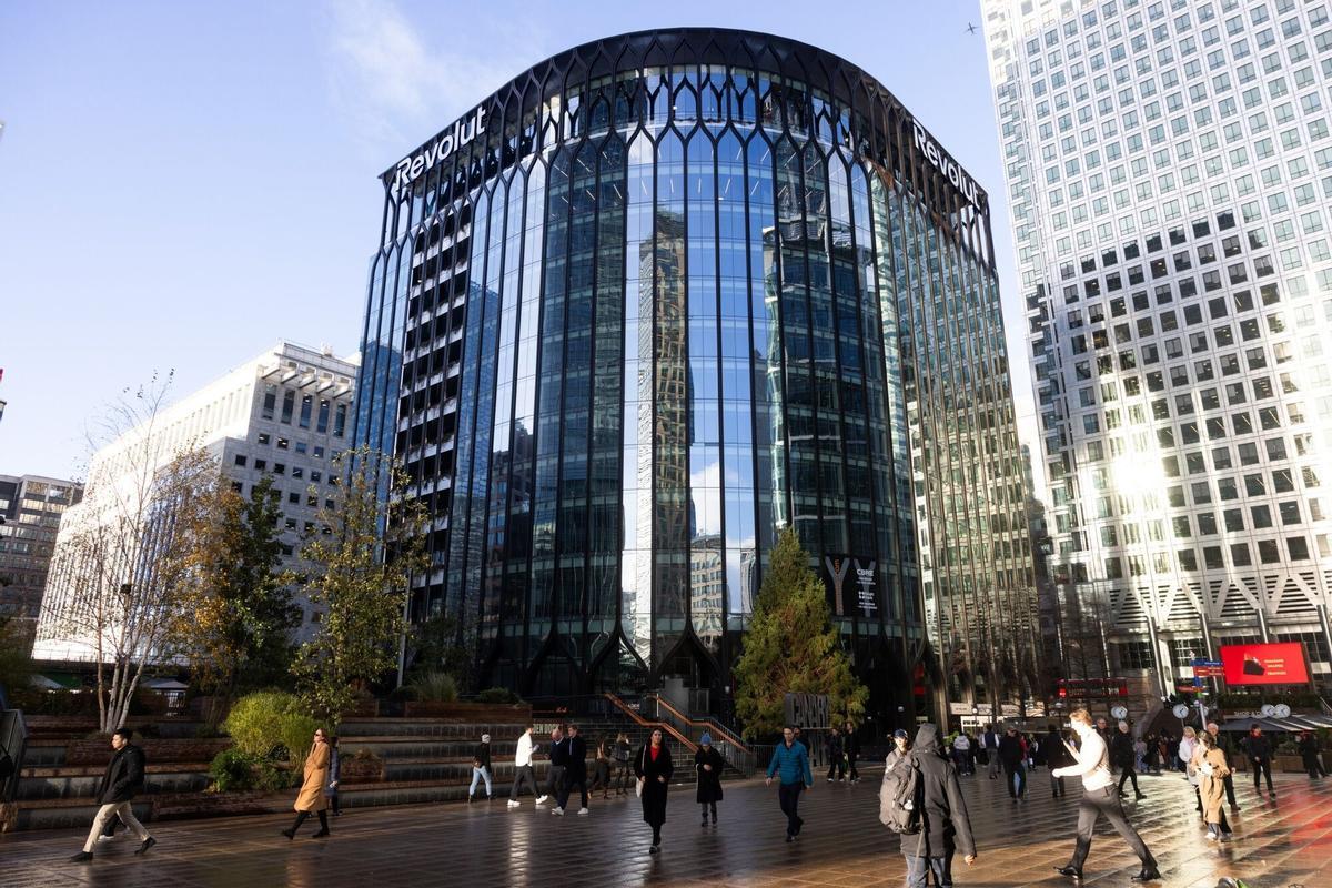 The Revolut Ltd. headquarters in Canary Wharf, London, UK, on Tuesday, Dec. 2, 2025. Measures in the UK budget to attract more companies to the London Stock Exchange will help the bourse compete against the Nasdaq for financial technology listings, the chair of challenger bank Revolut Ltd. said. Photographer: Chris Ratcliffe/Bloomberg