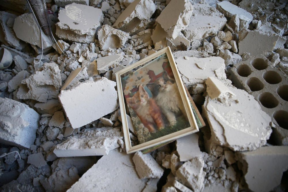 Un cuadro entre los escombros en una zona controlado por los rebeldes en Damasco.