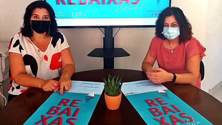 Las directivas de la Asociación de Empresarios de Redondela, Ana Belén Fabre y María Cruz Bastos, presentaron la campaña. |   // FDV