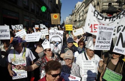 Demonstrators shout slogans as they arrive to the Puerta del Sol on the second anniversary of the 15M movement in central Madrid