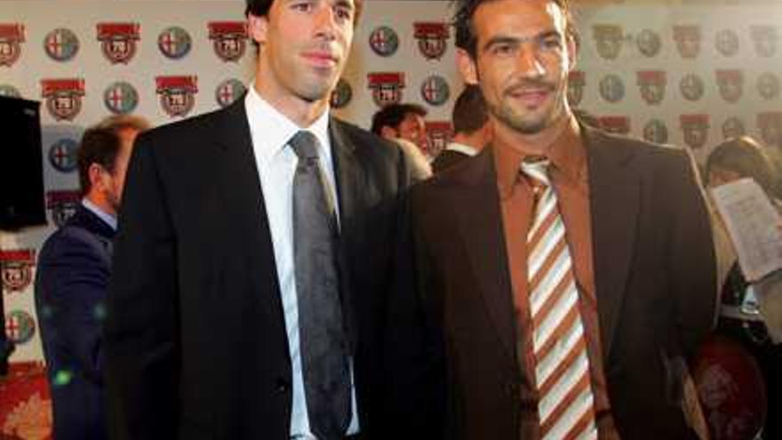 Ruud Van Nistelrroy (I) y Marcos Márquez.