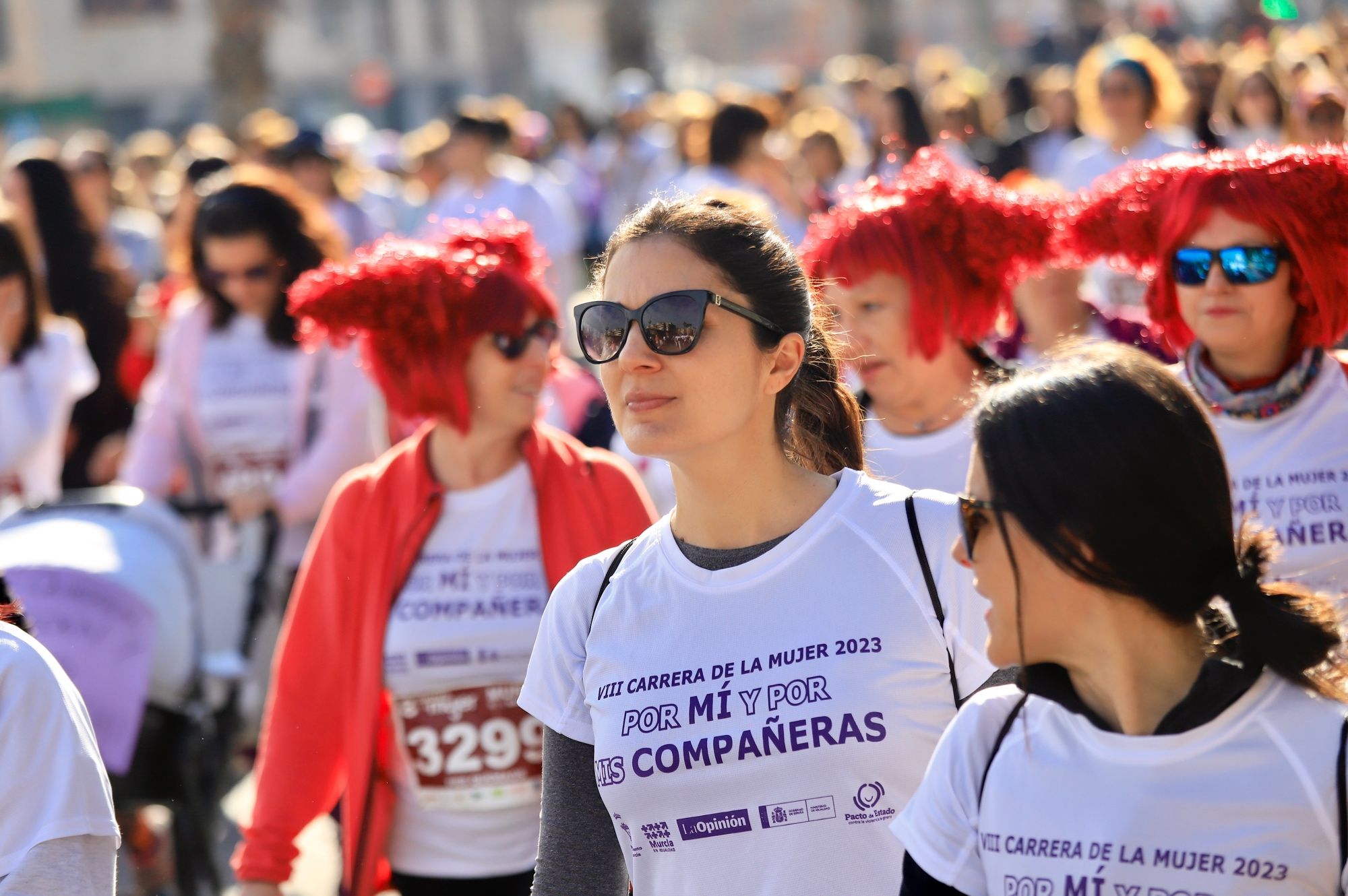 La salida y el recorrido de la Carrera de la Mujer 'inmortalizados' en imágenes