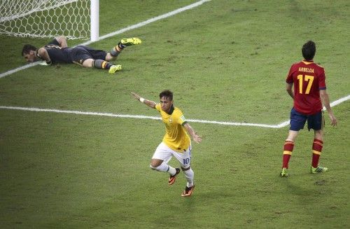 Brazil's Neymar celebrates scoring a goal against Spain during the Confederations Cup final soccer match in Rio de Janeiro