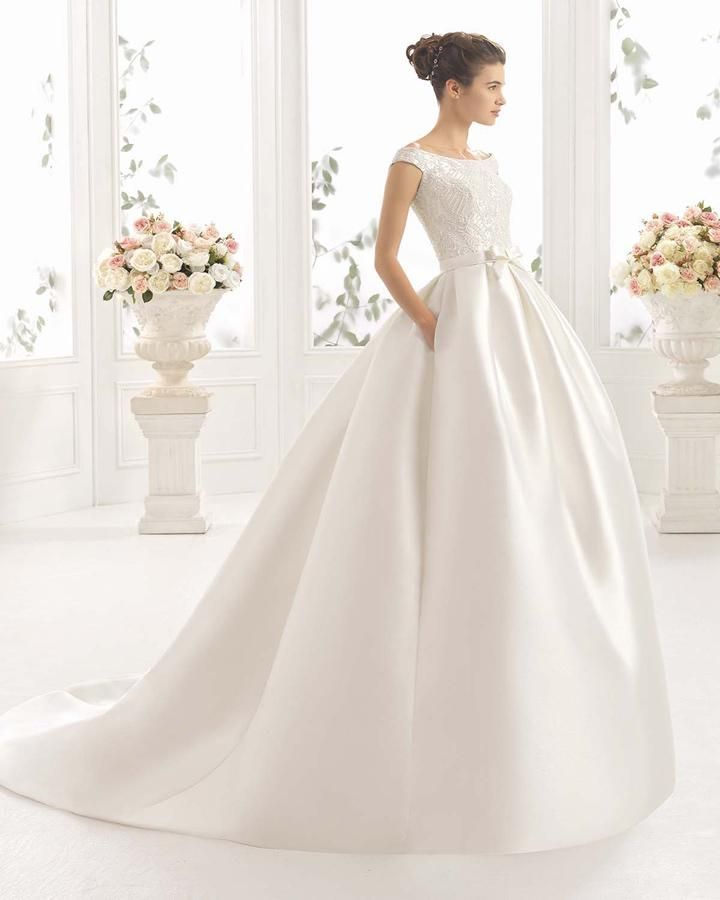 Vestidos de novia sencillos y bonitos: faldas lisas y cuerpos bordados