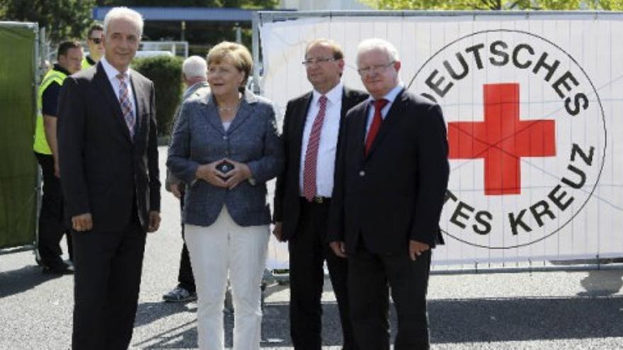 Merkel visita el centro de acogida de refugiados de Heidenau