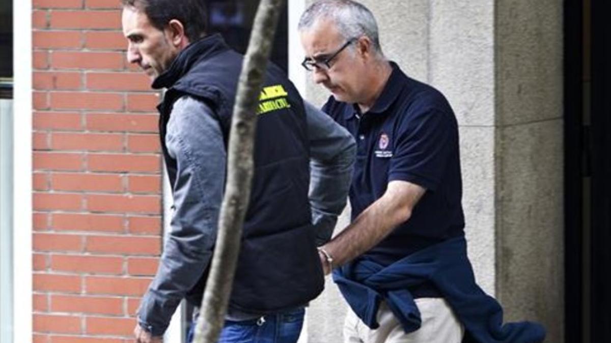 Detenidos 8 Rosario Porto y Alfonso Basterra, en septiembre del 2013, poco después de ser arrestados.