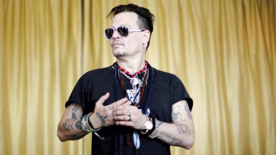 El actor estadounidense Johnny Depp, ayer, en Lisboa. // Reuters