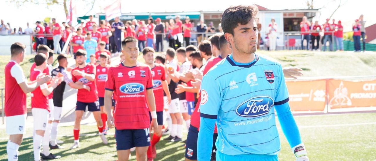 Pasillo al campeón antes del inicio.