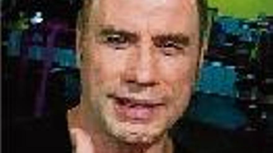 John Travolta mostra el cap sense perruca després de fer exercici
