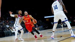 Ricky Rubio intenta penetrar a canasta ante Damian Lillard