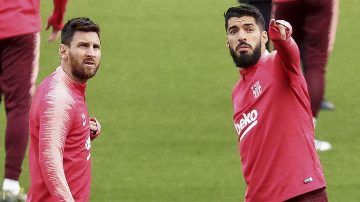 Leo Messi y Luis Suárez durante un entrenamiento del FC Barcelona