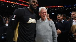 NEW YORK, NEW YORK - JANUARY 23: Former U.S. President Bill Clinton poses with LeBron James #23 of the Los Angeles Lakers following the game against the Brooklyn Nets at Barclays Center on January 23, 2020 in New York City. NOTE TO USER: User expressly acknowledges and agrees that, by downloading and or using this photograph, User is consenting to the terms and conditions of the Getty Images License Agreement.   Mike Stobe/Getty Images/AFP