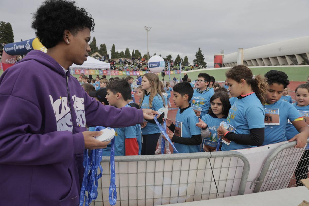 FOTOS | La XVI Cursa Infantil de Reis llena Son Moix de ilusión, deporte y ambiente familiar tras aplazarse por el mal tiempo