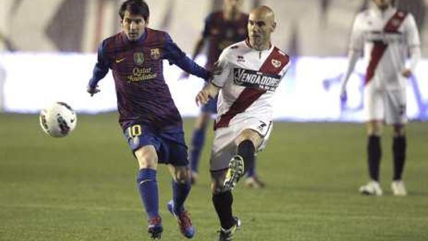 Movilla y Messi, durante el Rayo-Barça del año pasado.