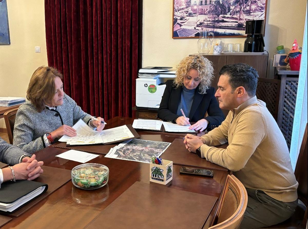 La firma del convenio.