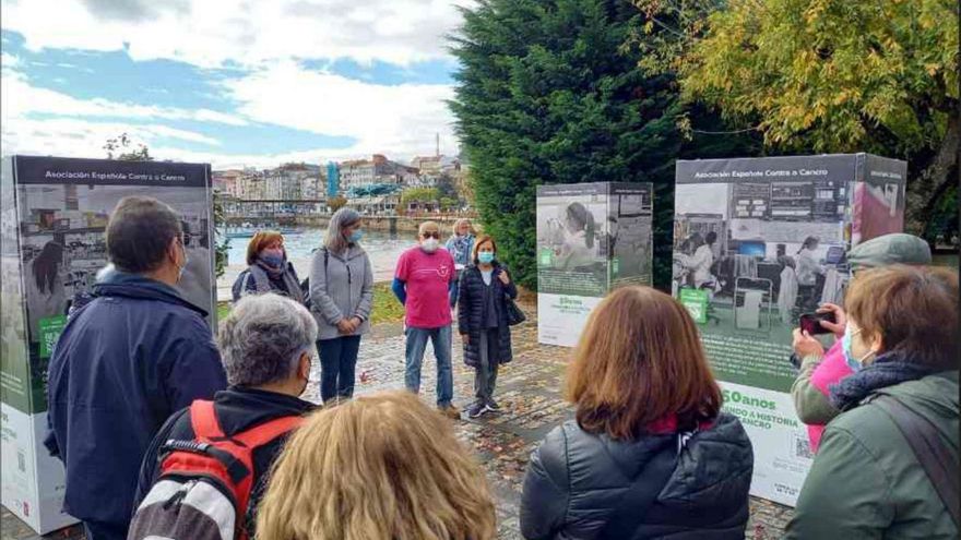 Acto de inauguración de la exposición sobre los 50 años de investigación del cáncer. | // S.Á.