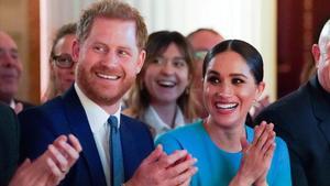 FILE PHOTO  Britain s Prince Harry and his wife Meghan  Duchess of Sussex  cheer during the annual Endeavour Fund Awards at Mansion House in London  Britain March 5  2020  Paul Edwards Pool via REUTERS File Photo