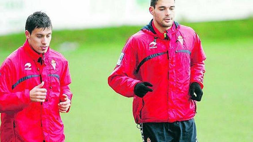 Canella y Botía, corriendo al margen del grupo al comienzo del entrenamiento de ayer.