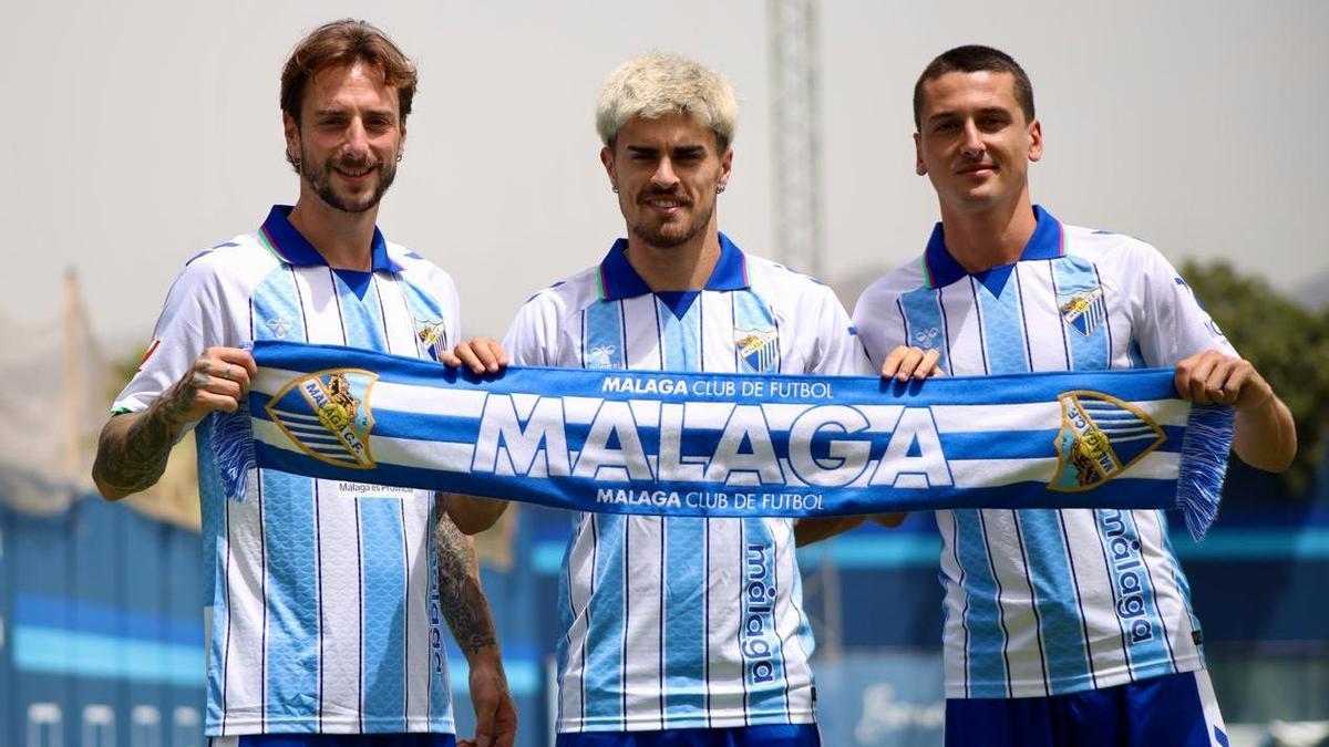 Fernando Calero, Juan Cruz y Carlos Dotor, este jueves en su presentación con el Málaga CF.