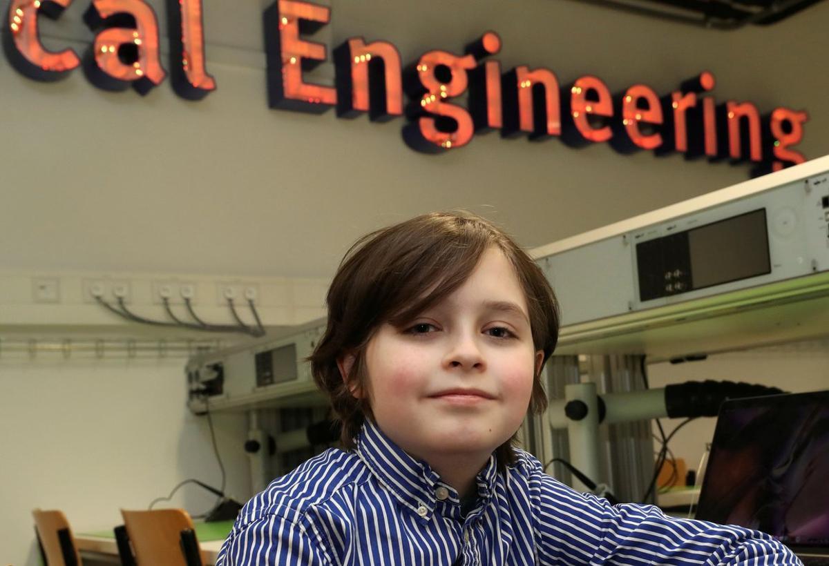 FILE PHOTO: Nine-year-old Belgian student Laurent Simons, who studies electrical engineering and was on track to become the youngest university graduate in the world, poses at the University of Technology in Eindhoven, Netherlands November 20, 2019.  Picture taken November 20, 2019.  REUTERS/Yves Herman/File Photo