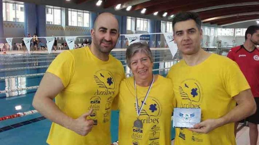 Los tres nadadores zamoranos que acudieron a la cita.