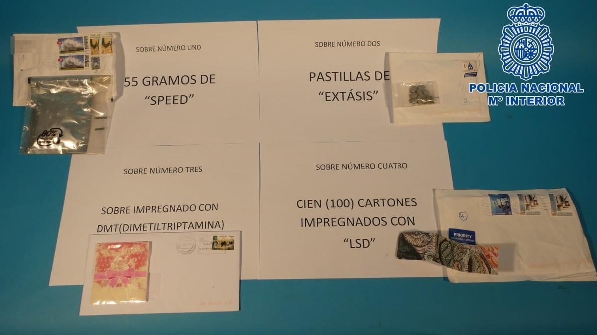 Sustancias y dinero incautado por agentes de la Policía Nacional.