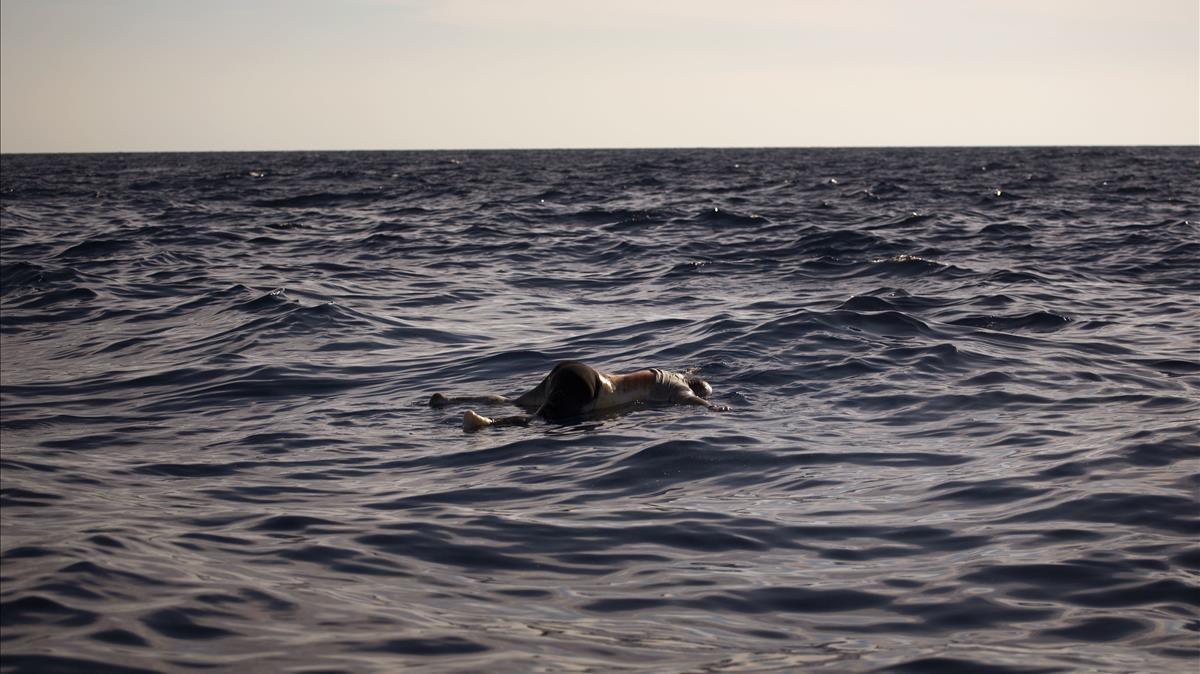 mbenach39691558 the dead body of a woman is seen floating on the mediterrane170814203302