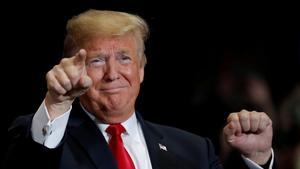 FILE PHOTO:    U.S. President Donald Trump gestures at a campaign rally on the eve of the U.S. mid-term elections at the Show Me Center in Cape Girardeau, Missouri, U.S., November 5, 2018.  REUTERS/Carlos Barria/File Photo