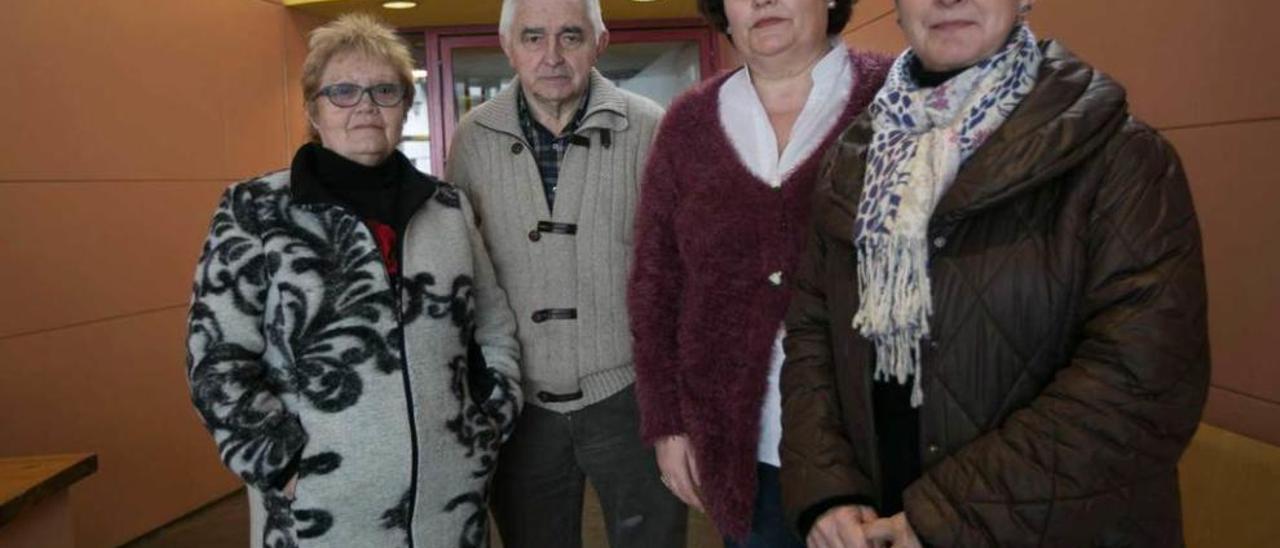 Rosa Fernández, Javier Fernández Conde, Raquel García Zapico y María Eva Iglesias Llaneza, en las instalaciones de LA NUEVA ESPAÑA en Oviedo.