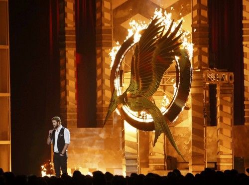 Liam Hemsworth introduces a clip from "The Hunger Games: Catching Fire" at the 2013 MTV Movie Awards in Culver City, California