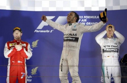 Mercedes Formula One driver Hamilton of Britain celebrates his victory on the podium after Bahrain's F1 Grand Prix at Bahrain International Circuit