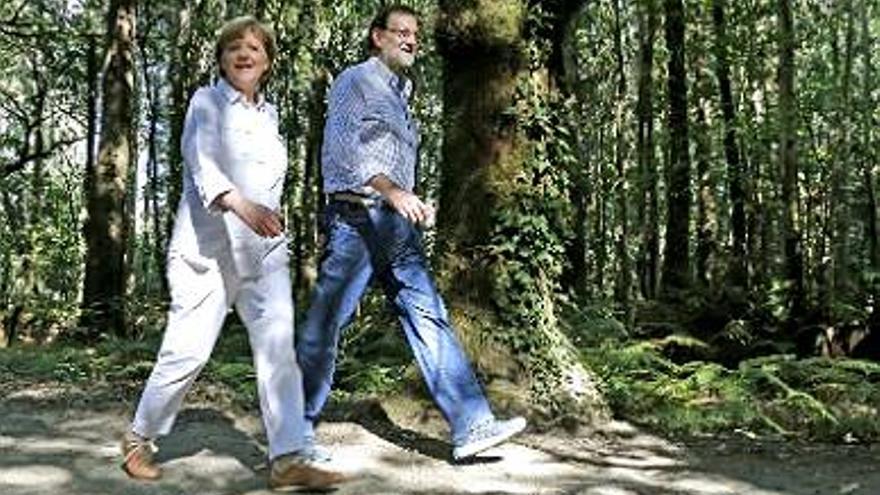 Rajoy y Merkel, juntos en el Camino de Santiago