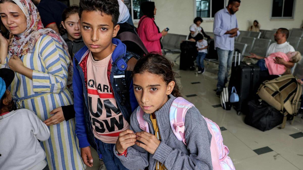 Ciudadanos gazaties con doble nacionalidad en Rafah.