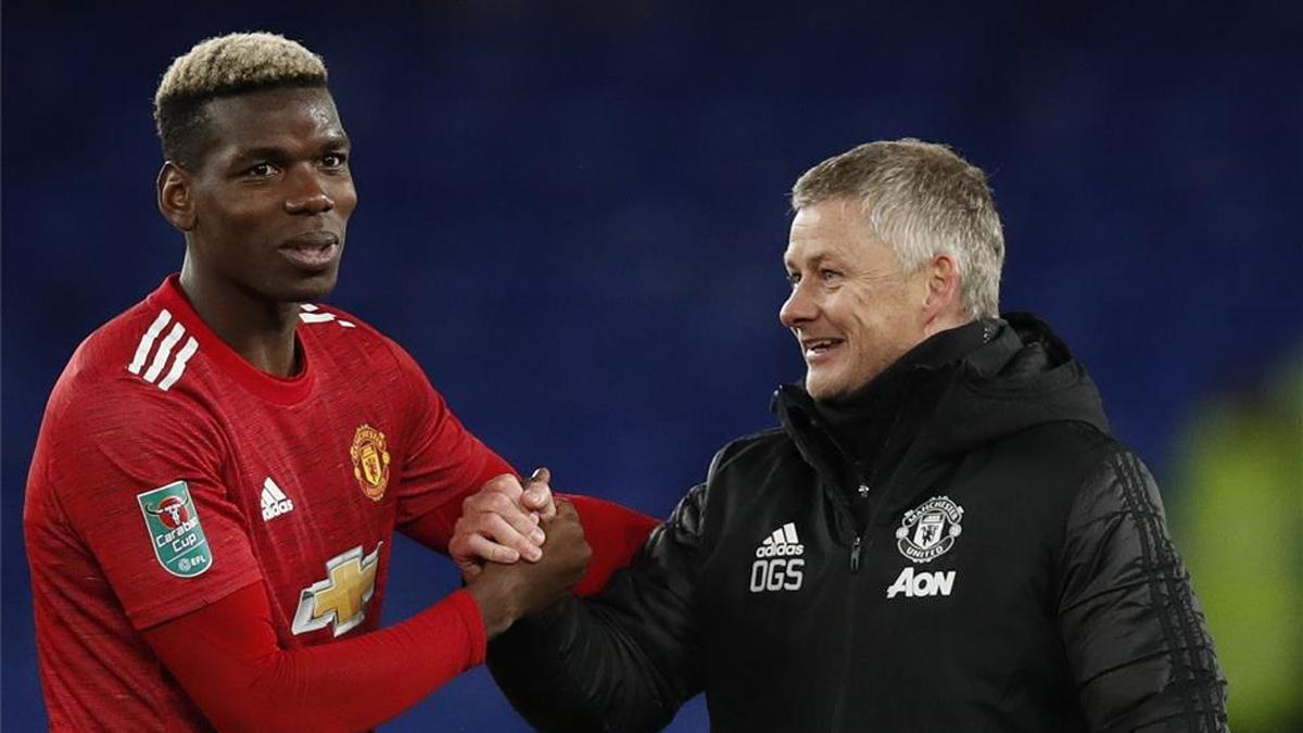 Pogba y Solskjaer celebran la clasificación del United