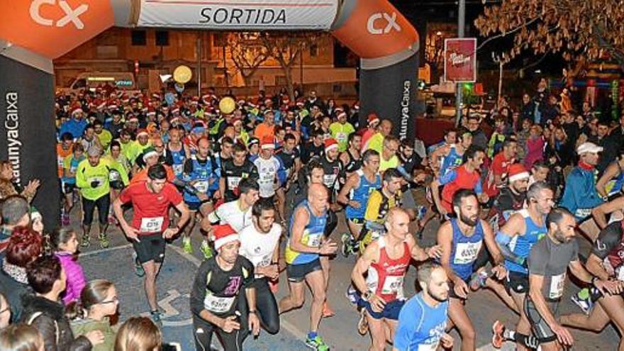 Moment de la sortida de la cursa nocturna de Nadal, en categoria gran