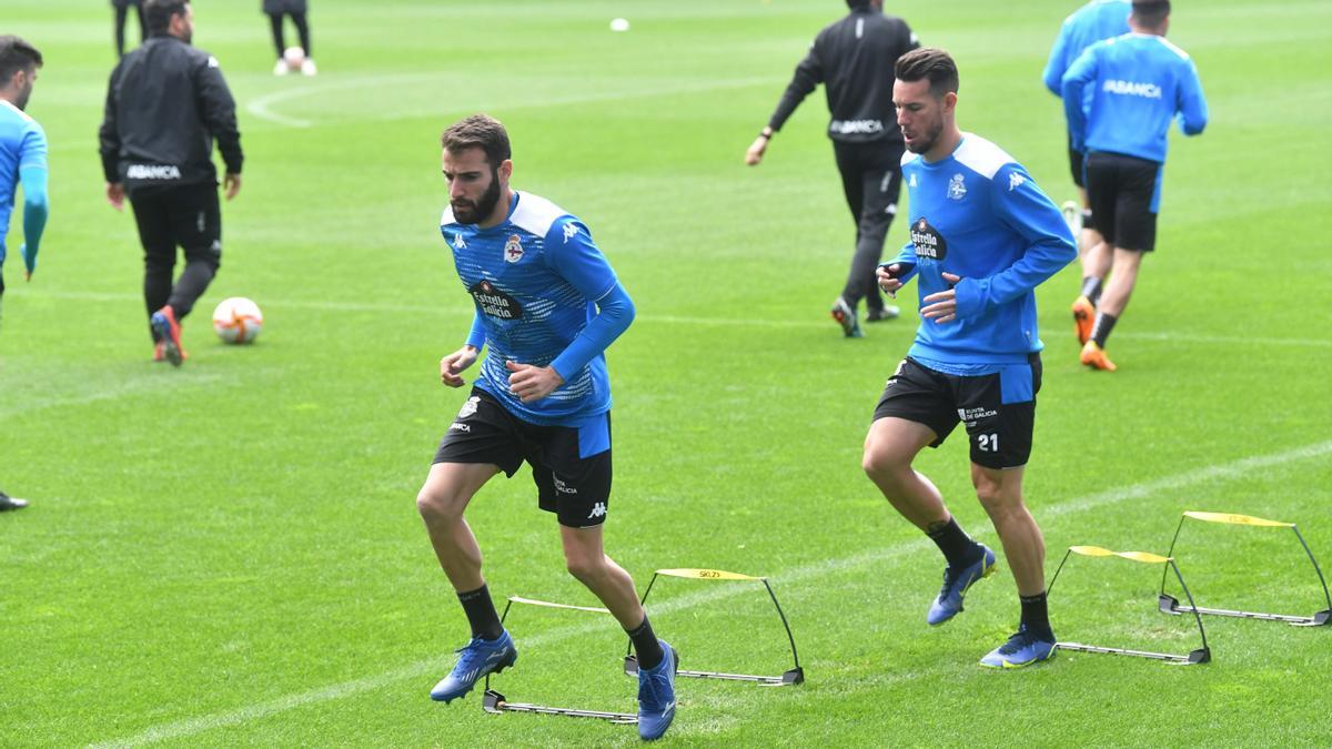 Antoñito, junto a Álvaro Rey, en el entrenamiento de ayer en Riazor.