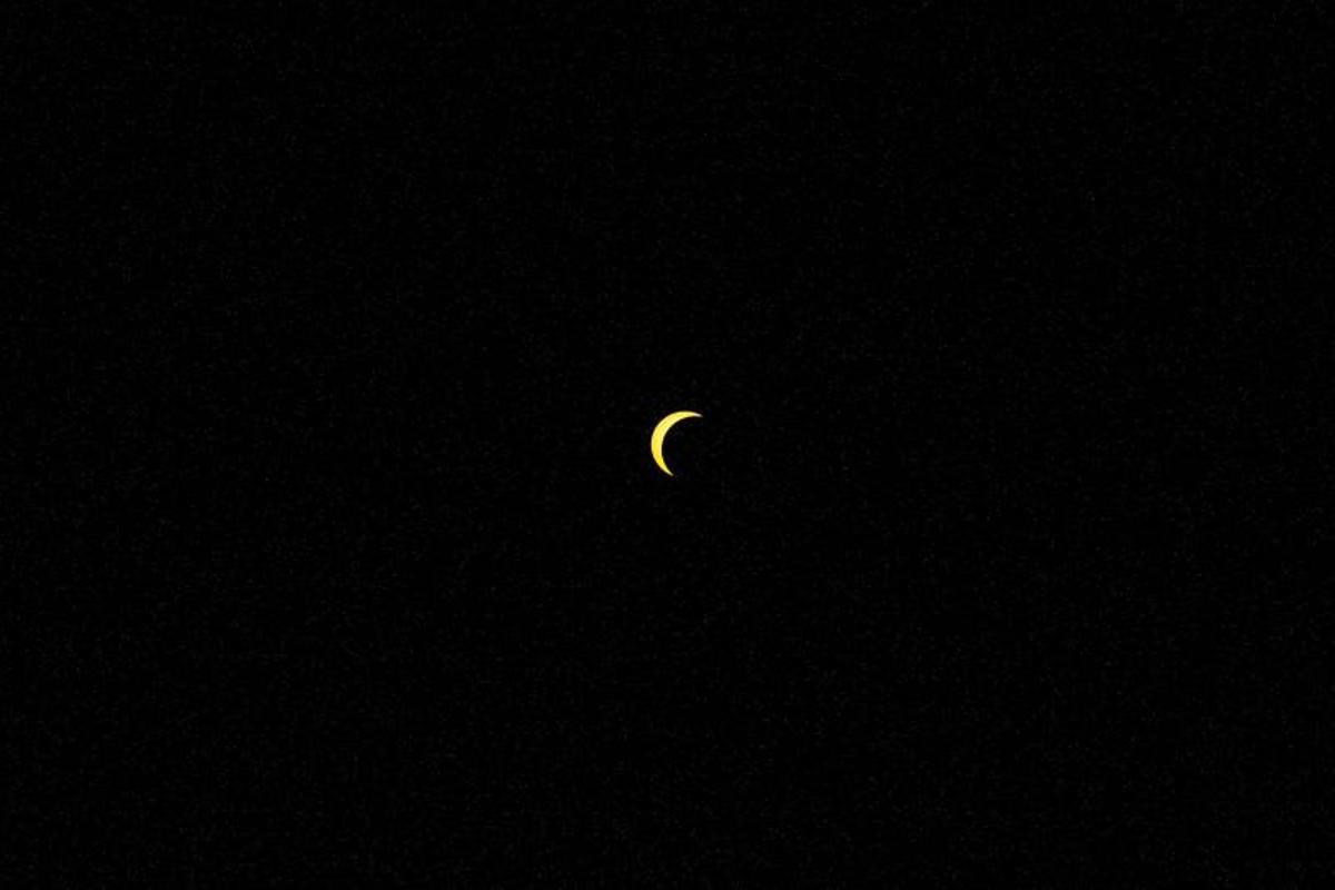 Imagenes del Eclipse solar visto desde el Castillo de Montjuic.
