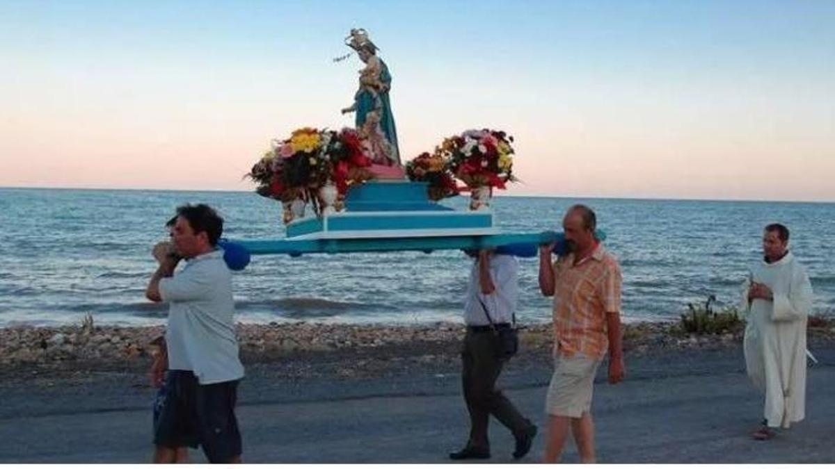 La Virgen, en procesión por el Grau Vell, en una anterior edición.