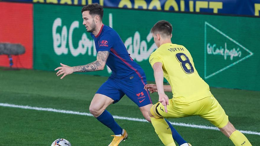 Juan Foyth y Saul Niguez.