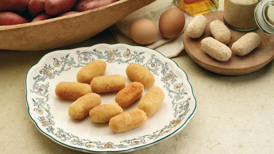 Unas ricas croquetas de patata y queso.