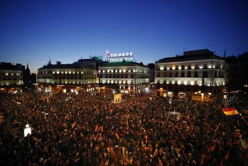 People take part in a anti-monarchist demonstration at Madrid's landmark Puerta del Sol Square